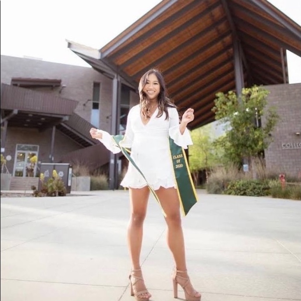 Saints + Secrets long sleeve white romper